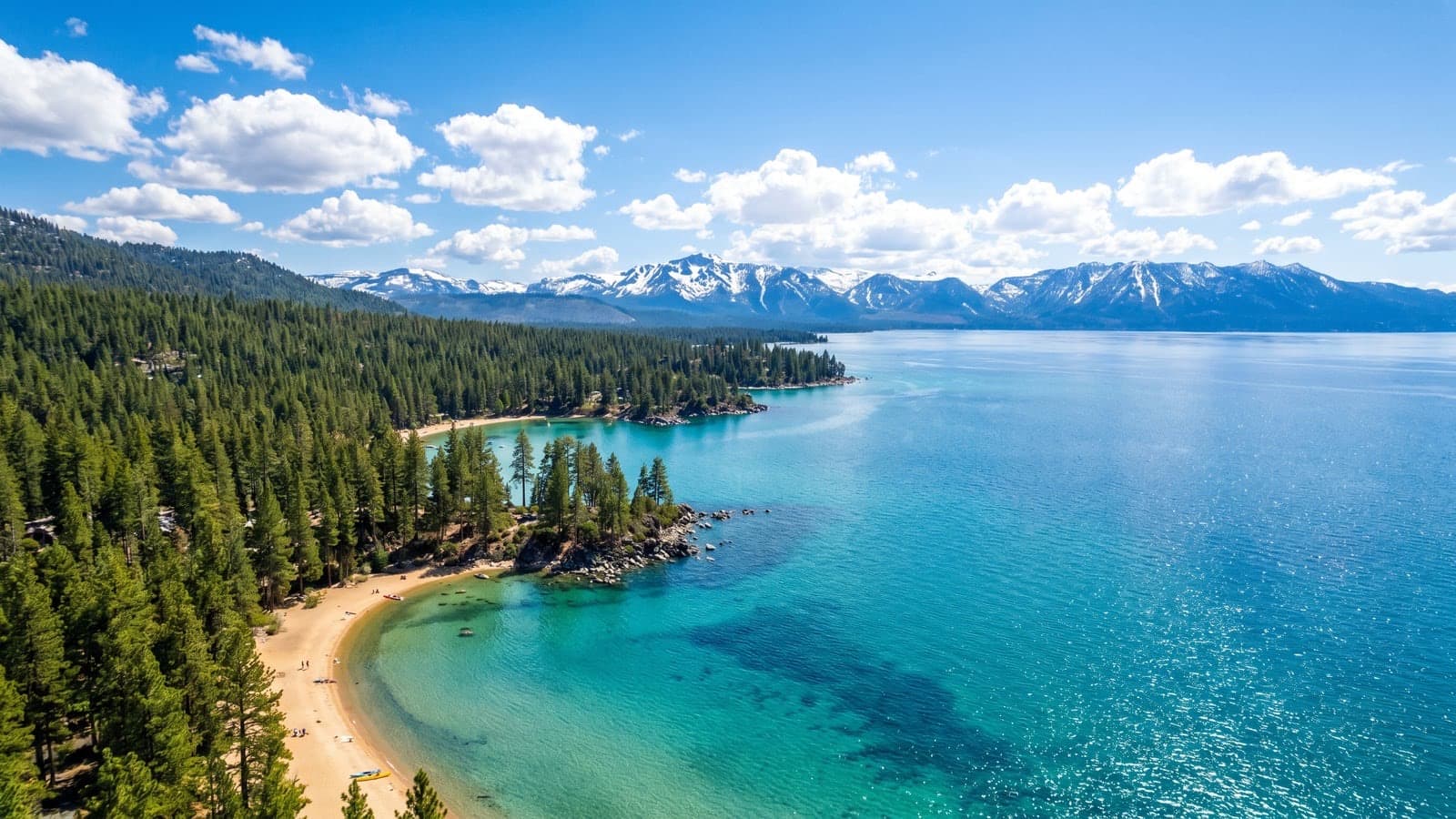 Zephyr Cove lakefront homes on the Nevada east shore of Lake Tahoe with Sierra Nevada backdrop