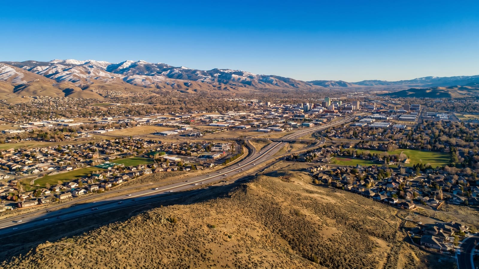 Reno-Sparks Truckee Meadows valley aerial — Reno housing costs and home prices 2026